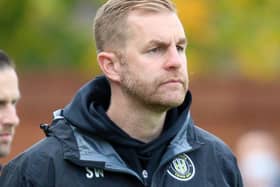 Harrogate Town manager Simon Weaver looks on from the sidelines during his side's historic 1-0 home win over Barrow at the EnviroVent Stadium. Pictures: Matt Kikrham