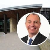 Harrogate council leader Richard Cooper said the authority remains in a "relatively strong financial position" after being awarded the latest funding.