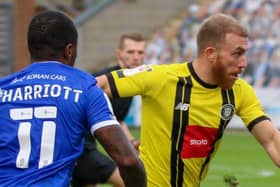 George Thomson in action for Harrogate Town during Saturday's League Two defeat to Colchester United. Pictures: Matt Kirkham