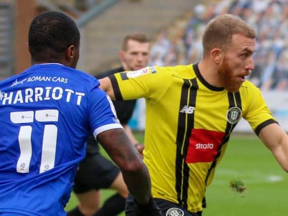 George Thomson in action for Harrogate Town during Saturday's League Two defeat to Colchester United. Pictures: Matt Kirkham