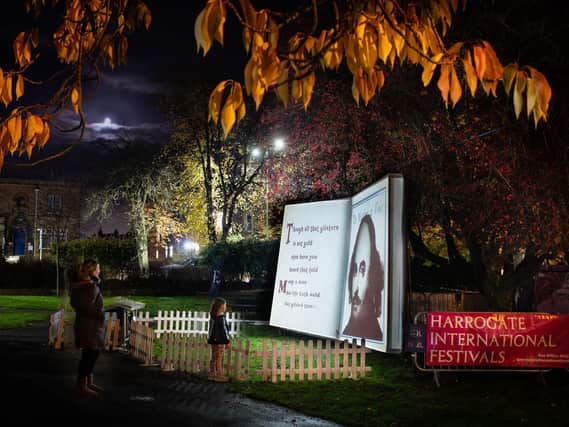 A youngster enjoys the Codex installation in Harrogate town centre, which was a part of Raworths Harrogate Literature Festival. (Photo by Richard Maude)