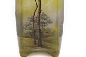 A Daum Nancy Enamelled Cameo Landscape Vase realised £2,200 at auction.