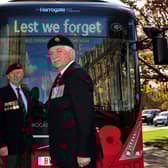 Royal British Legion Knaresborough branch Chairman Alan Pitchfork (left) and Standard Bearer Paul Darley, with one of the Harrogate Bus Company’s buses displaying its own poppy to support the Legion’s annual Poppy Appeal