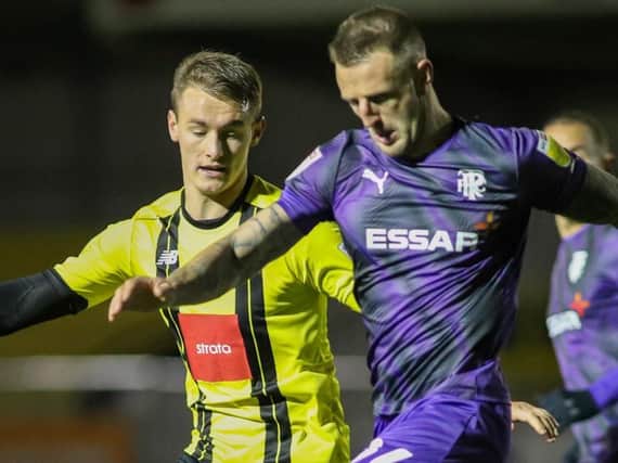 Will Smith was carried from the field of play with a neck injury sustained during the closing stages of Harrogate Town’s home loss to Tranmere Rovers. Pictures: Matt Kirkham