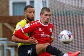 Harrogate Town utility man Warren Burrell challenges Crawley's Max Watters. Pictures: Matt Kirkham