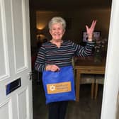 Anne Cliff, who joined Dancing for Well-Being a few years ago, is delighted to receive a prop bag to keep on dancing.