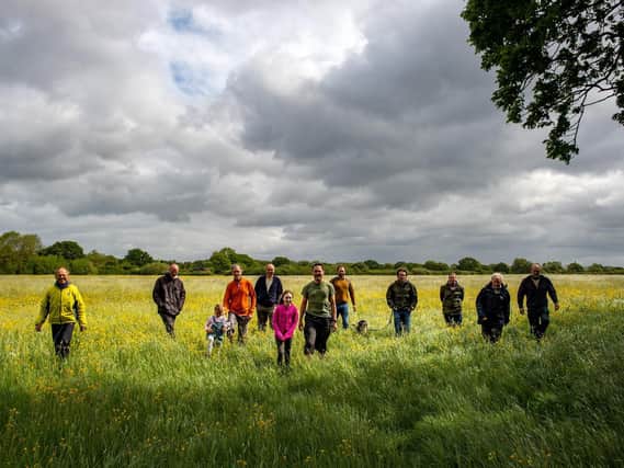 Success - Long Lands Common volunteers in the area of what will be Harrogate's first community-owned woodland adjacent to the Nidderdale Greenway near Bilton.
(Picture Bruce Rollinson)