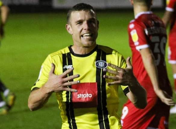 Harrogate Town's Jack Muldoon shows off his painted fingernails after netting against Crawley Town on World Diabetes Day. Picture: Matt Kirkham