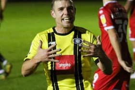 Harrogate Town's Jack Muldoon shows off his painted fingernails after netting against Crawley Town on World Diabetes Day. Picture: Matt Kirkham