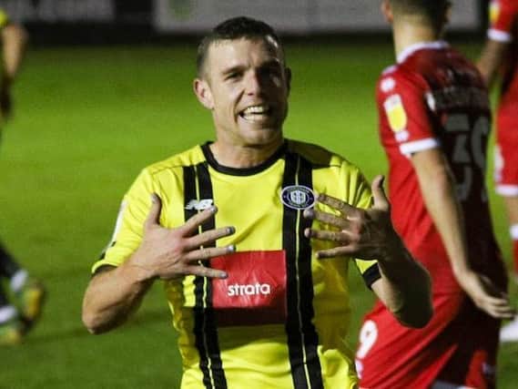 Harrogate Town's Jack Muldoon shows off his painted fingernails after netting against Crawley Town on World Diabetes Day. Picture: Matt Kirkham