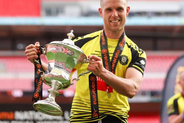 Jack Muldoon at Wembley with the National League play-off final winners' trophy after helping Harrogate Town secure promotion to the EFL for the first time in their history. Picture: Matt Kirkham