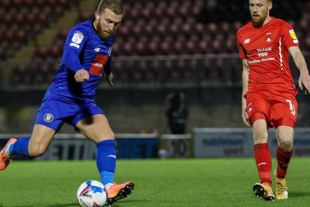 George Thomson takes aim at the Orient goal.