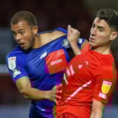 Aaron Martin challenges for the ball during Harrogate Town's loss at Leyton Orient. Pictures: Matt Kirkham