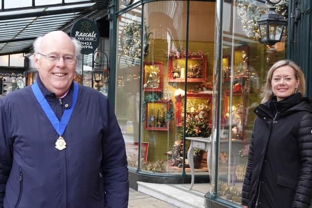 Harrogate Christmas Shop Window contest - Harrogate Rotary Club member and competition organiser Graham Saunders with Sara Ferguson, the acting chair of new partners Harrogate Business Improvement District (BID).