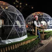 Ready for Christmas customers - The igloos at the Fat Badger in Harrogate with HRH Group's managing director Simon Cotton. (Picture Gerard Binks)