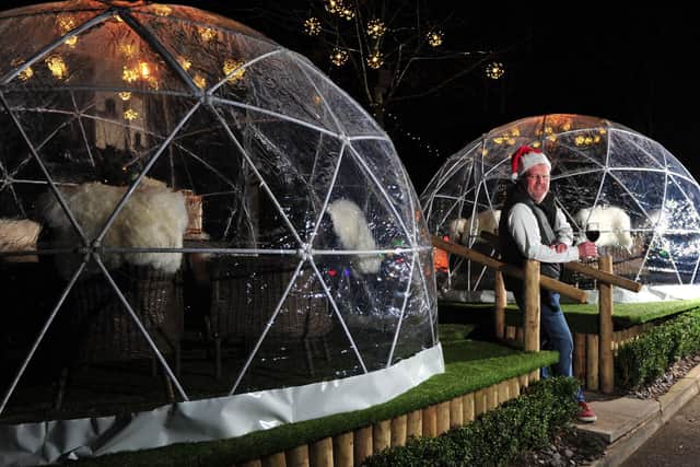 Ready for Christmas customers - The igloos at the Fat Badger in Harrogate with HRH Group's managing director Simon Cotton. (Picture Gerard Binks)