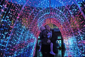 14th November 2020.
Harrogate switch on their Christmas lights.
Pictured Rachel Hodgson and her daughter 3 year old Violet in the light installation outside the Victoria Shopping Centre
Picture Gerard Binks
