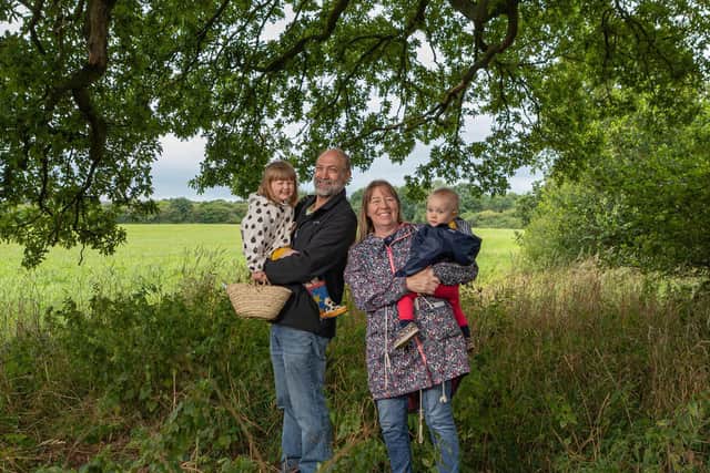 Long Lands Common board members Rick Brewis and Trish Sanders with their grandchildren at the site between Harrogate and Knaresborough of Long Lands Common. (Photograph by Gary Lawson)