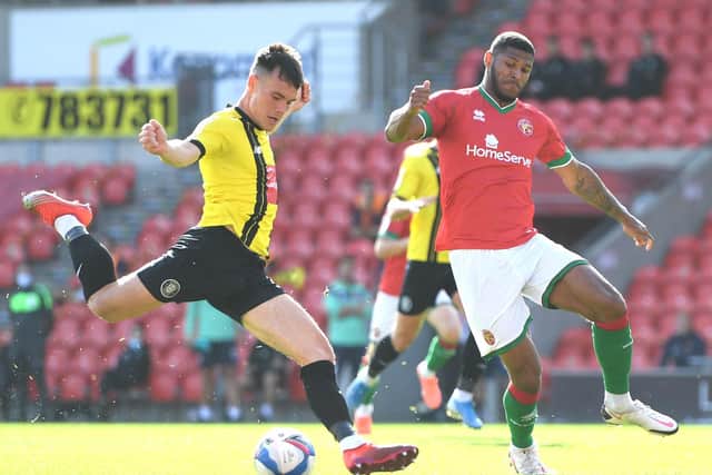 Harrogate Town's Ryan Fallowfield delivers the ball into the Walsall box during the 2-2 League Two draw between the sides back in September.