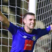 Jack Muldoon celebrates the second of his two strikes during Harrogate Town’s 2-1 win at Grimsby. Pictures: Matt Kirkham