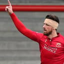 Morecambe striker Cole Stockton has four goals to his name so far this season, but could miss Saturday's clash with Harrogate Town. Pictures: Getty Images.