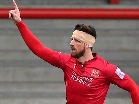 Morecambe striker Cole Stockton has four goals to his name so far this season, but could miss Saturday's clash with Harrogate Town. Pictures: Getty Images.