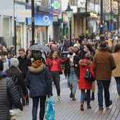 Return to the shops - Christmas shoppers flood to Harrogate's Cambridge Street last Saturday after the lockdown ended. (Picture Gerard Binks)