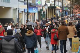 Return to the shops - Christmas shoppers flood to Harrogate's Cambridge Street last Saturday after the lockdown ended. (Picture Gerard Binks)