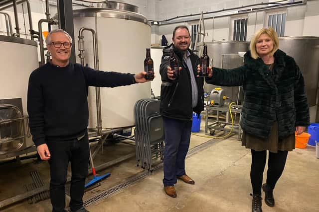 Raising a bottle of the ‘Thirsty Six’ beer celebrating Harrogate’s ever-popular 36 bus route are (centre) The Harrogate Bus Company CEO Alex Hornby, flanked by Harrogate Brewing Company owners Joe and Julie Joyce