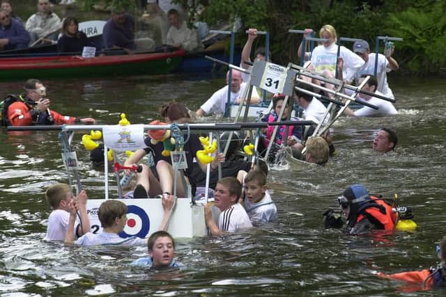 It was the 36 th annual Knaresborough Bed Race on Saturday) and each team had to complete a course around the North Yorkshire town with the final section being the crossing of the River Nidd. Pictured, watched by safety crew, are some of the middle order teams crossing the Nidd. jun 8 2001.