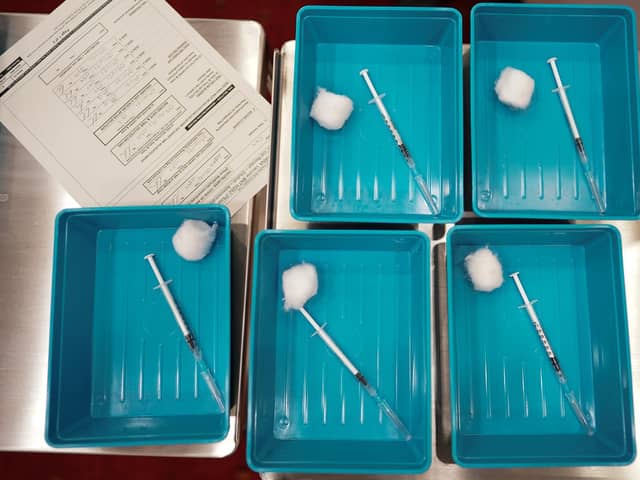 Pfizer BioNTech Covid-19 vaccines are laid out to be administered at a mass vaccination hub at the Centre For Life in Newcastle. Photo: PA