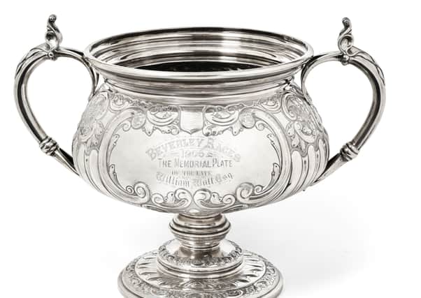 This Edward VII Silver Trophy-Cup by William Aitken of Birmingham, 1905 sold for £9,000.