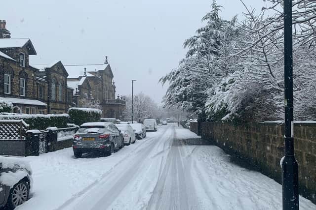 Yellow weather warning - Road and pavement blend into one today at Grove Road in Harrogate.