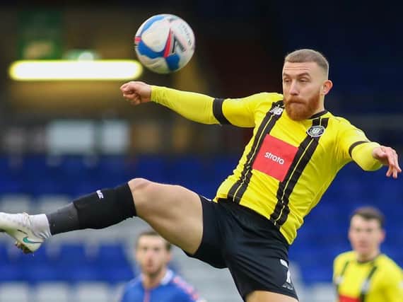 Harrogate Town's George Thomson in action against Oldham Athletic on Boxing Day. Pictures: Matt Kirkham