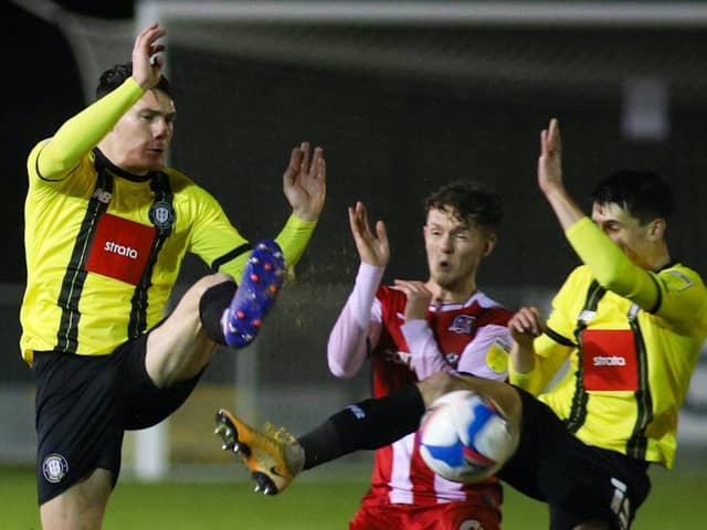 Ryan Fallowfield, left, in action during Harrogate Town's goalless draw with Exeter City. Pictures: Matt Kirkham