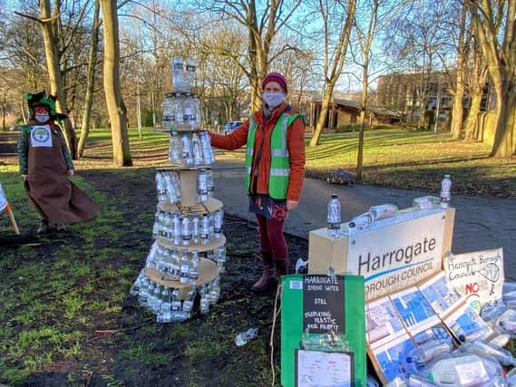 Green protesters delivering local messages in bottles at the entrance of Harrogate Civic Centre earlier today.