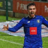 Ed Francis celebrates after netting Harrogate Town's 93rd-minute equaliser at Salford City. Pictures: Matt Kirkham