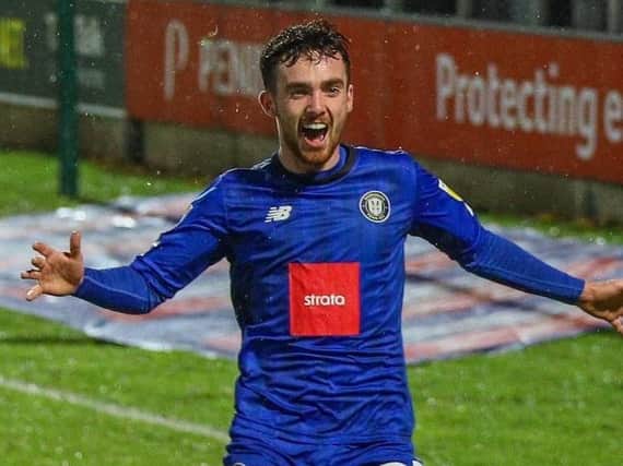 Ed Francis celebrates after netting Harrogate Town's 93rd-minute equaliser at Salford City. Pictures: Matt Kirkham