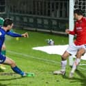 Ed Francis stabs home Harrogate Town's 93rd-minute equaliser at Salford City. Pictures: Matt Kirkham