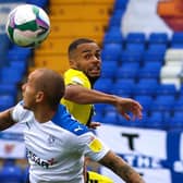 Warren Burrell in Carabao Cup action against Tranmere Rovers during what was Harrogate Town's first-ever outing as an EFL club. The versatile defender could return at Prenton Park following a one-match ban. Pictures: Matt Kirkham