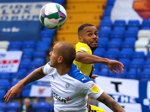 Warren Burrell in Carabao Cup action against Tranmere Rovers during what was Harrogate Town's first-ever outing as an EFL club. The versatile defender could return at Prenton Park following a one-match ban. Pictures: Matt Kirkham