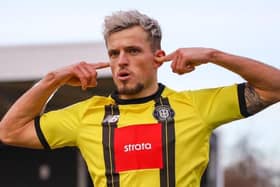 Josh March celebrates after firing in Harrogate Town's 34th-minute equaliser against Newport County. Pictures: Matt Kirkham