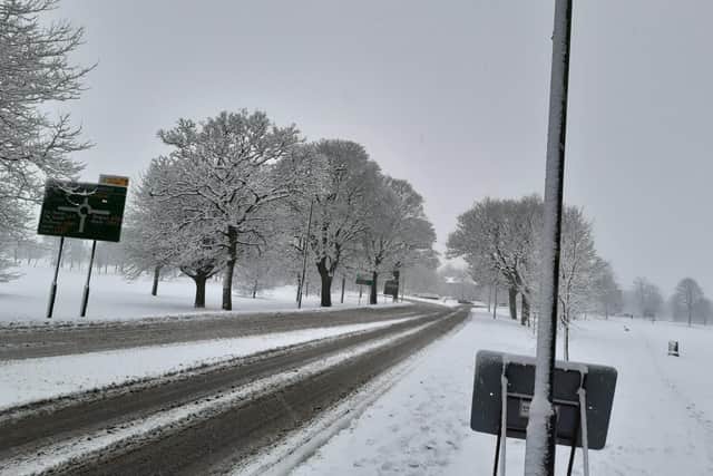 Snow hits Harrogate - An almost deserted Empress Roundabout in the middle of Harrogate today.
