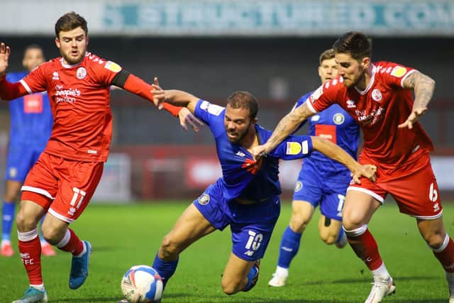 Aaron Martin competes for the ball during Town's 3-1 League Two success.