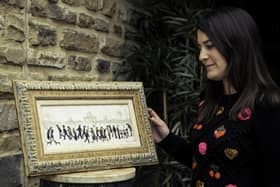 Tennants’ Modern and Contemporary Art Specialist Francesca Young is pictured with L.S. Lowry ‘People in a Park’ – estimate: £60,000-90,000.