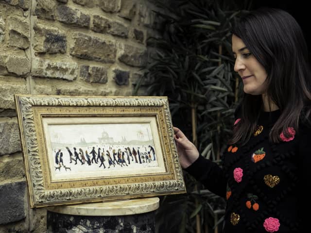 Tennants’ Modern and Contemporary Art Specialist Francesca Young is pictured with L.S. Lowry ‘People in a Park’ – estimate: £60,000-90,000.