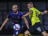 Harrogate Town match-winner Aaron Martin shoots at the Mansfield goal. Pictures: Matt Kirkham