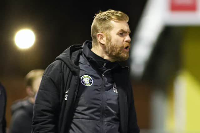 Town chief Simon Weaver was not pleased by what he saw during the first 45 minutes of Tuesday's League Two showdown with the Stags.