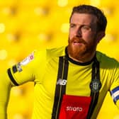 George Thomson was handed the captain's armband for Harrogate Town's League Two showdown with Grimsby. Pictures: Matt Kirkham