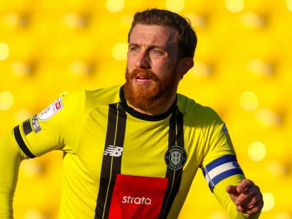 George Thomson was handed the captain's armband for Harrogate Town's League Two showdown with Grimsby. Pictures: Matt Kirkham
